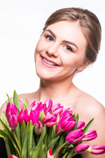 Beleza jovem mulher com tulipas — Fotografia de Stock