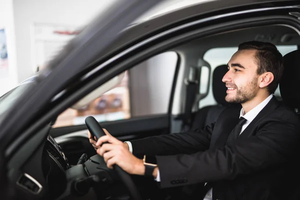 Attractive elegant happy man drive good car — Stock Photo, Image