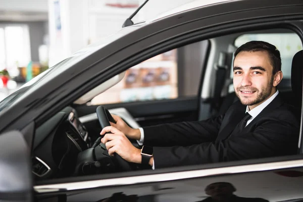Attractive elegant happy man drive good car — Stock Photo, Image