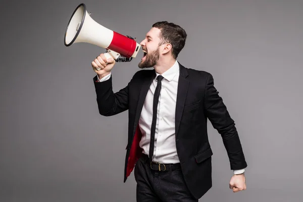 Retrato lateral Homem de negócios gritando com um megafone — Fotografia de Stock