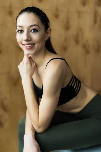 Fitness, sport, training, gym and lifestyle concept - young woman sitting on exercise fitness ball — Stock Photo, Image