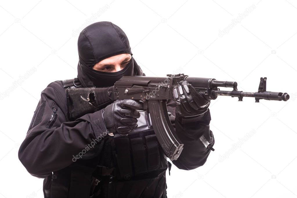Armed man with gun on white background