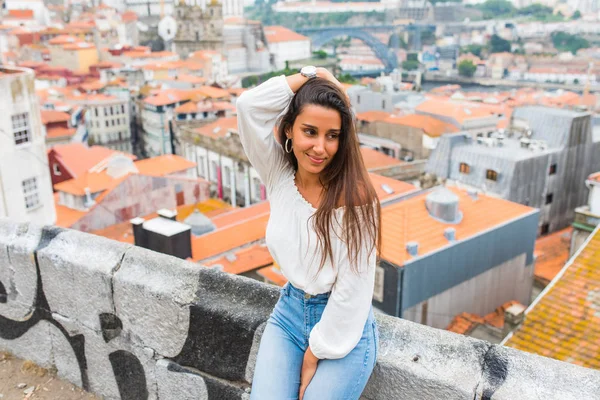Young woman posing on panorama of Porto, Portugal. — Stock Photo, Image
