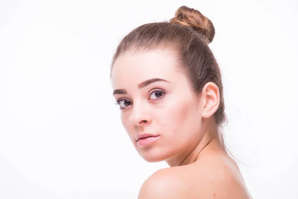 Beautiful woman cares for the skin neck- posing at studio isolated — Stock Photo, Image