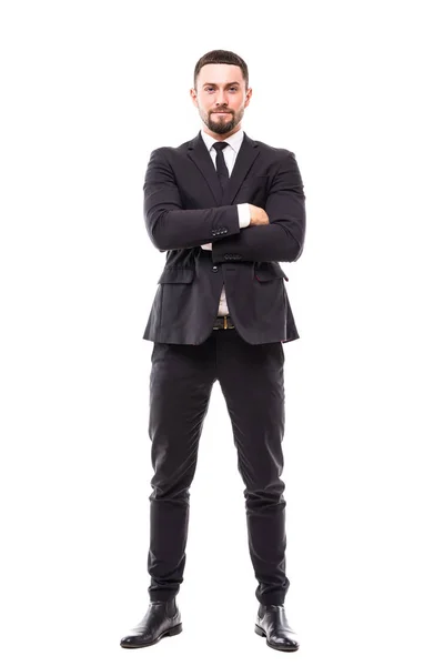 Corpo inteiro imagem de um homem de negócios com braços cruzados no fundo branco — Fotografia de Stock