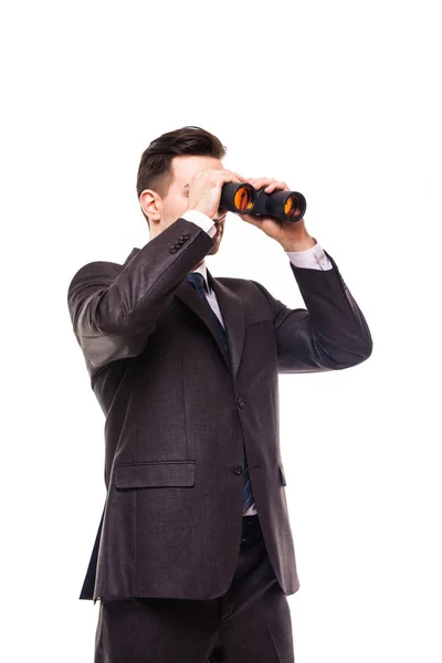 Hombre de negocios americano usando prismáticos en blanco — Foto de Stock