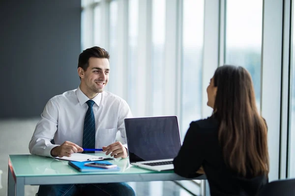 Business people Having Meeting Around Table In Modern Office. Young man listen woman in office — Stock Photo, Image