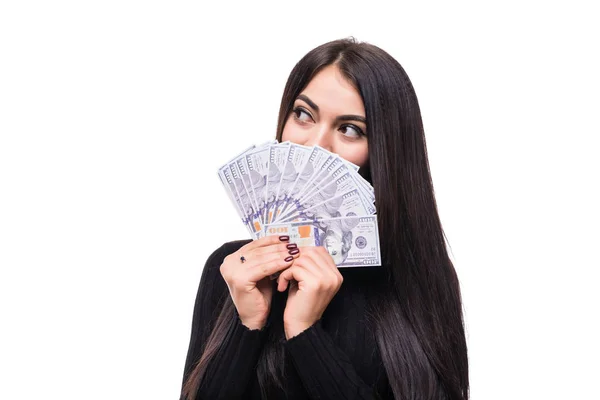 Glad framgångsrik ung kvinna håller dollar i händer med toothy leende på vit bakgrund — Stockfoto