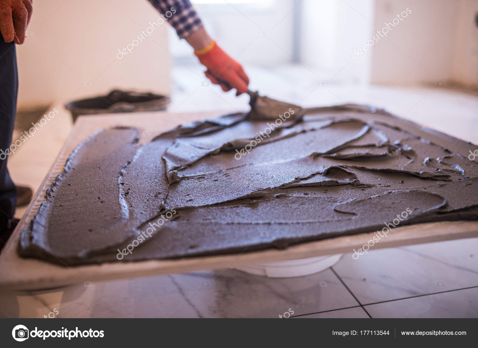 Laying Ceramic Tiles Worker Make Preparation For Laying Floor