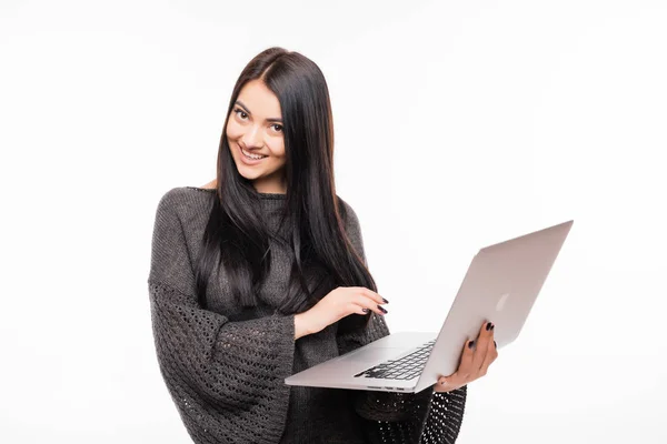 Happy woman showing laptop on white — Stock Photo, Image