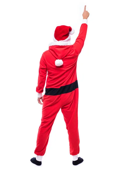 Vista posteriore del giovane in costume da Babbo Natale con le mani aperte puntate su sfondo bianco isolato — Foto Stock