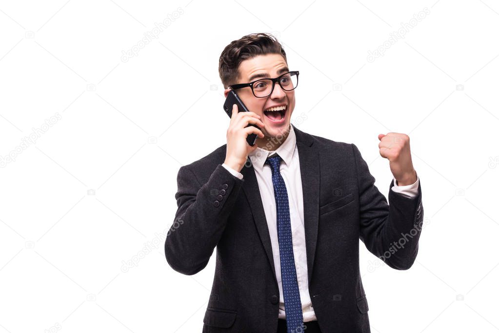 caucasian business person talking on cellphone, excited, rejoicing, isolated on white background.