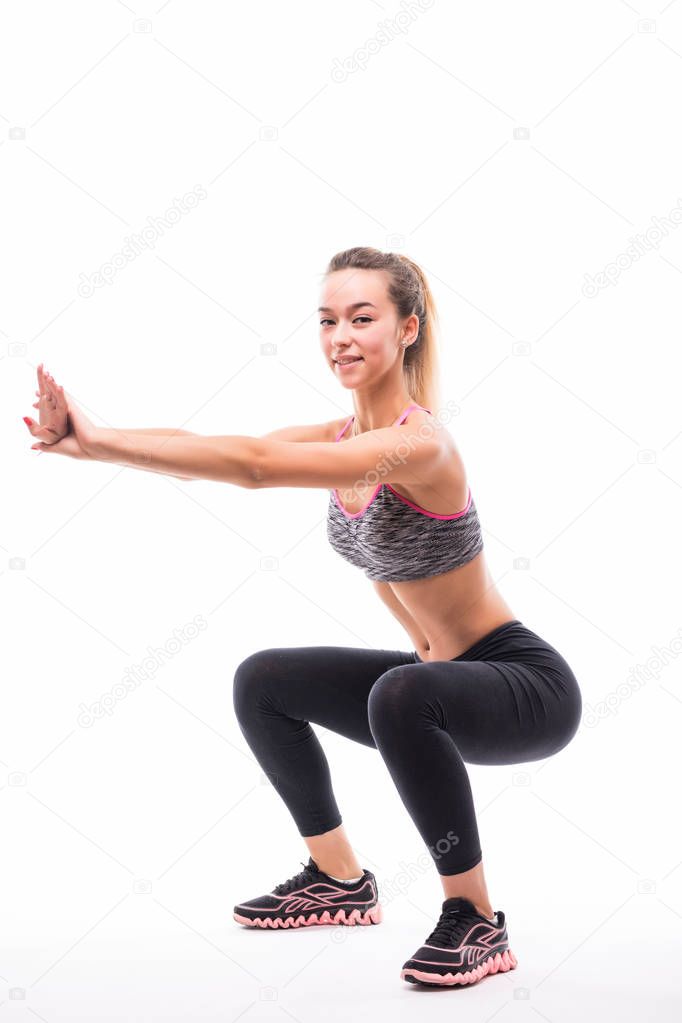 sport fitness woman, young healthy girl doing squat exercises, full length portrait over white background
