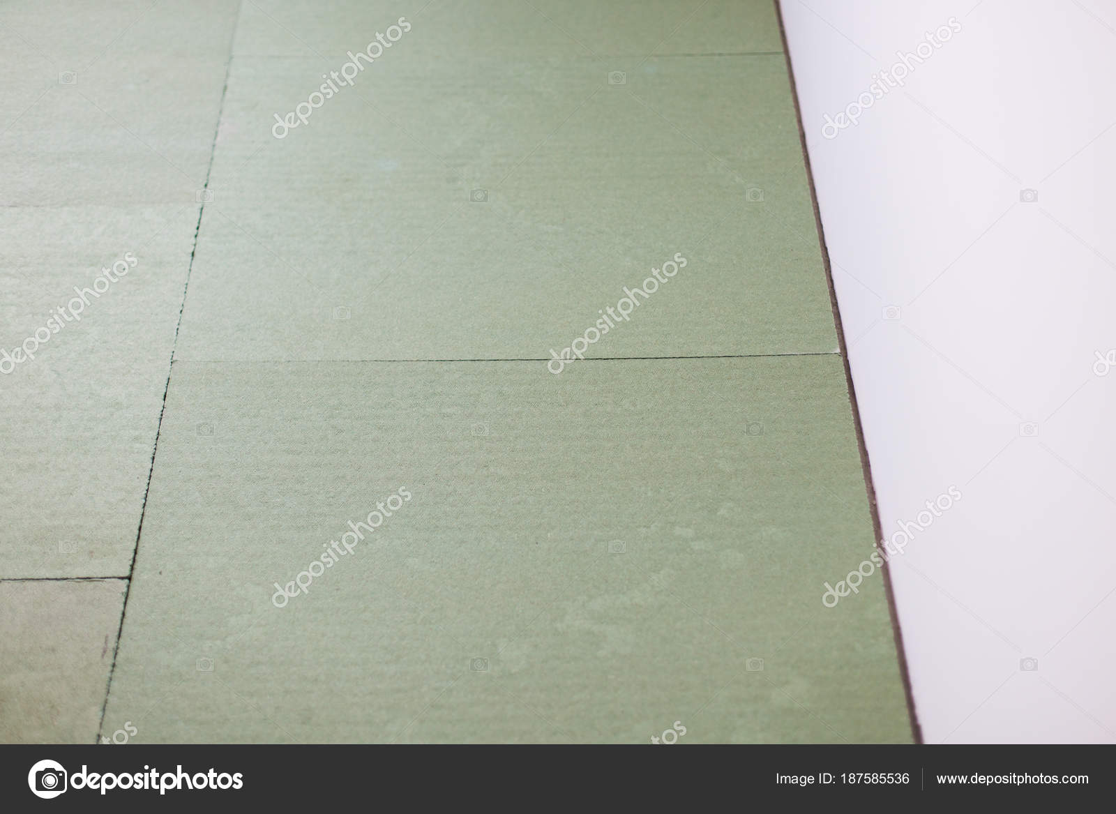 Laying Laminate Flooring Insulated Underlay On Floor Ready For