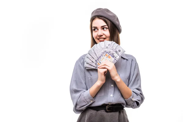 Imagen de la señora mirando cámara mientras cubre la cara con dinero dólares aislados sobre fondo blanco — Foto de Stock