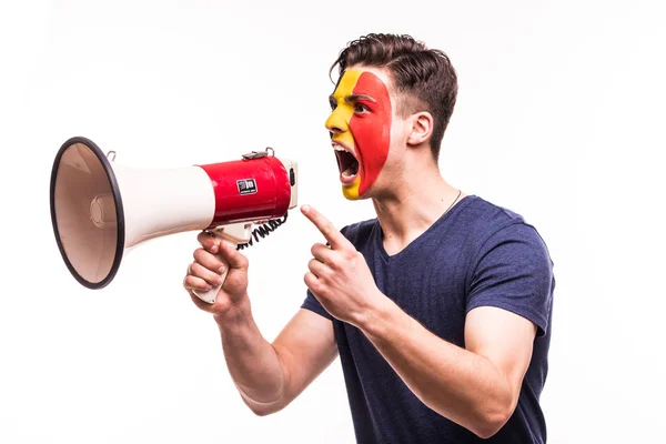 Fan support of Belgium national team with painted face shout and scream on megaphone isolated on white background — Stock Photo, Image