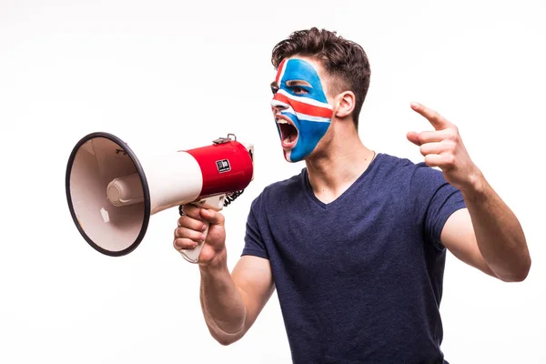 Fan support of Iceland national team with painted face shout with loudspeaker isolated on white background — Stock Photo, Image