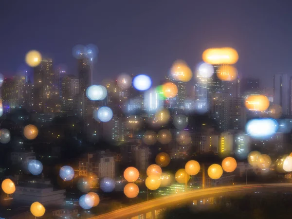 Şehrin gece ışık sahne bulanık bokeh görüntü