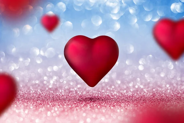 Valentýnské kartu - lesklé dvě srdce na červené a modré pozadí — Stock fotografie
