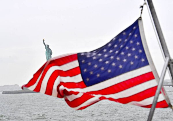  The Statue of Liberty in New York Harbor in a rainy autumn day