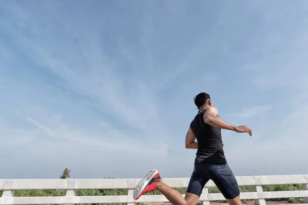 Fit young man running, Man running with concentration, determina