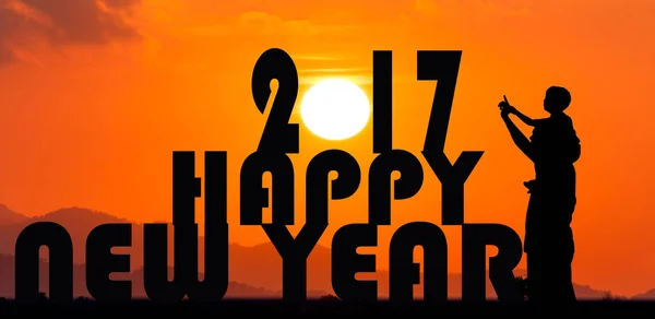 Koncepce, nový rok 2017 slunce nastavit pozadí — Stock fotografie