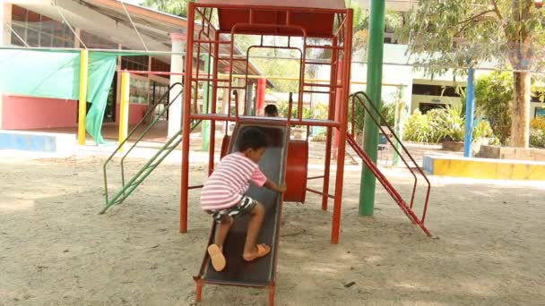 Wo cute asian boy playing at playground — Stock Video