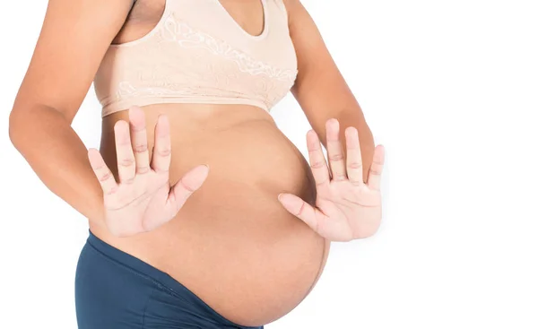 Las mujeres embarazadas muestran parada de mano — Foto de Stock