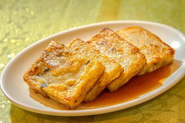 The deep fried Cantoneses Turnip Cake in Chinese restaurant