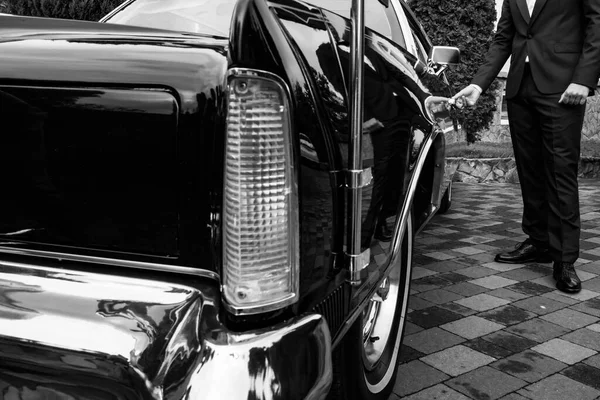 Retro Car Black Polished Bumpers Man Opens Door Black White — Stock Photo, Image