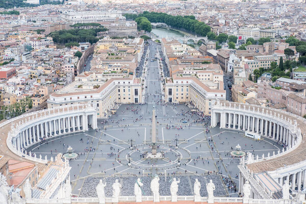 Saint Peter's Square, the large plaza in front of St. Peter's Basilica in Vatican City with the aerial view of Rome, Italy.