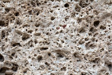 Ermeni tüyü, travertin. Büyük aralıklarla kayanın gözenekli yüzeyi. Tuff Stone Testeresi, Ermenistan 'dan Callibrated Fayans. Ararat Klasik Travertin. Tasarımınız için resim depolayın.