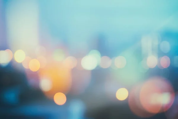 Abstrakter Hintergrund mit Bokeh defokussierten Lichtern und Schatten aus dem Stadtbild in der Nacht, Vintage oder Retro Farbton — Stockfoto