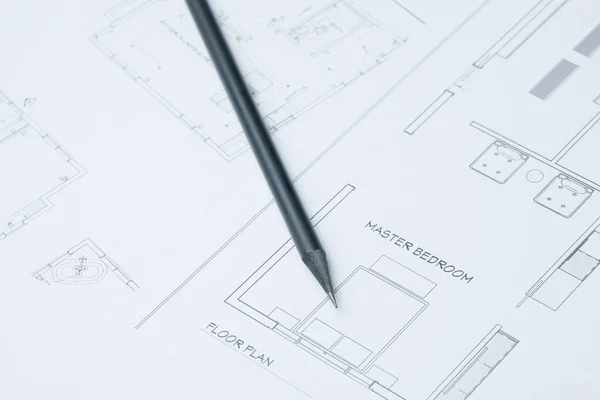 Black pencil on architectural drawing paper and rolls for construction — Stock Photo, Image