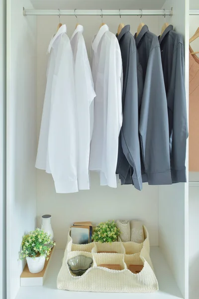 Male shirts haning in wardrobe — Stock Photo, Image