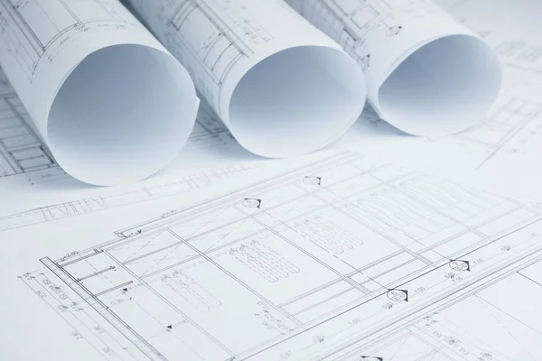 Architectural drawing paper rolls of a dwelling for construction — Stock Photo, Image