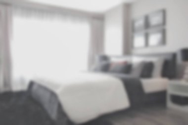 Arka plan bulanık yatak odasında modern iç tarzı