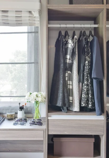 Row of black and white dress in wardrobe at home — Stock Photo, Image