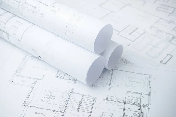 Architectural drawing paper rolls of a dwelling for construction — Stock Photo, Image