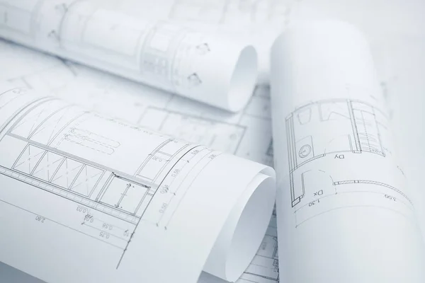 Architectural drawing paper rolls of a dwelling for construction — Stock Photo, Image