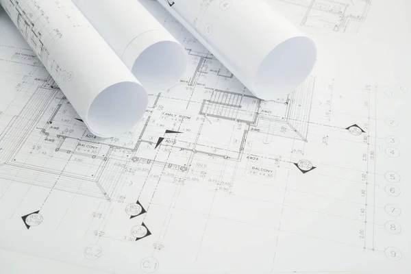 Architectural drawing paper rolls of a dwelling for construction — Stock Photo, Image