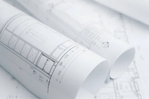 Rotoli di carta di disegno architettonico di un'abitazione per costruzione — Foto Stock