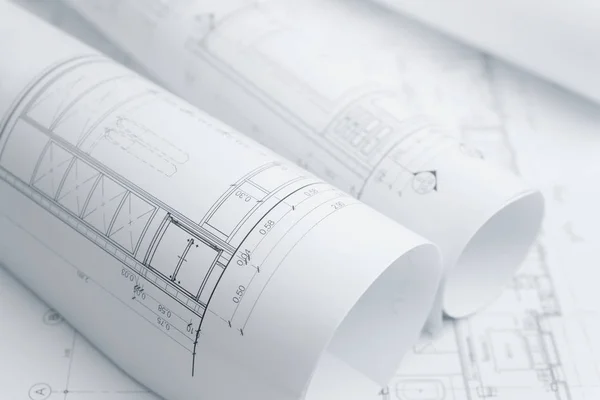 Architectural drawing paper rolls of a dwelling for construction — Stock Photo, Image