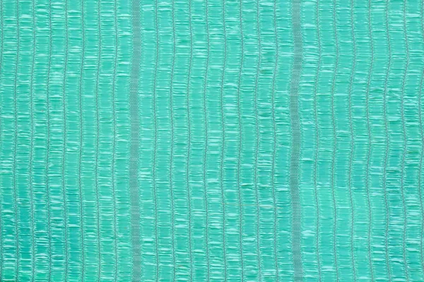 Zielone tło netto z tworzywa sztucznego — Zdjęcie stockowe