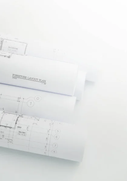 Architectural drawing paper rolls of a dwelling for construction — Stock Photo, Image