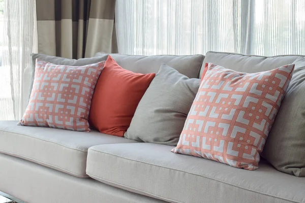 Chinese style pattern and red pillows on gray couch in comfort living room — Stock Photo, Image