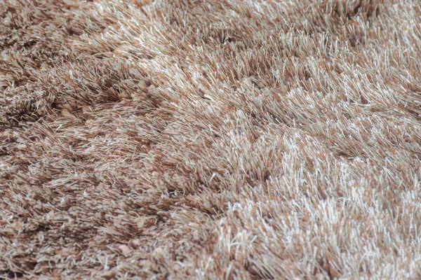 Cerca de la textura de la alfombra marrón para el fondo — Foto de Stock