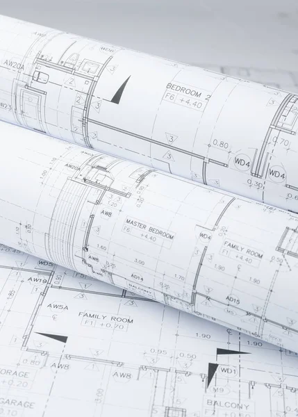 Rolos de papel de desenho arquitetônico de uma residência para construção — Fotografia de Stock