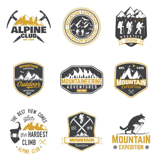 Vintage typography design with mountaineers and mountain silhouette.