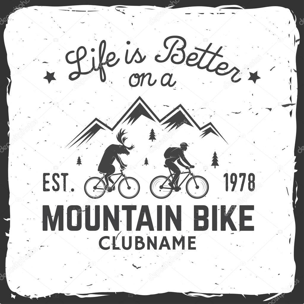Life is better on a mountain bike. Vector illustration. Concept for shirt or logo, print, stamp or tee. Vintage typography design with man riding bike and mountain silhouette. Outdoor adventure.